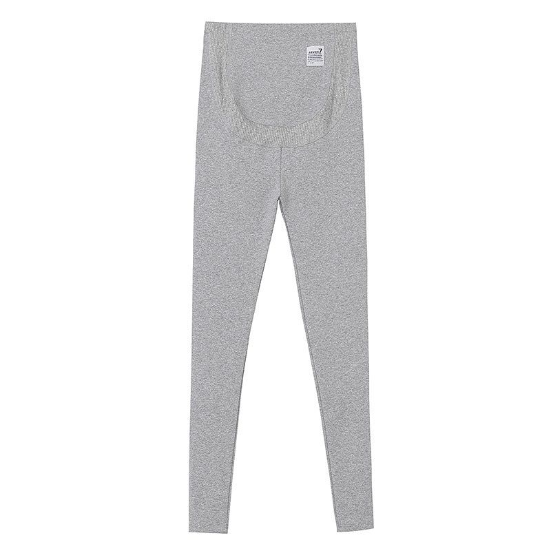 Light gray maternity leggings with a stretch belly panel and a small woven label, flat on a white background