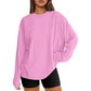 Pink loose fit long sleeve rayon top with black bike shorts, front view, size XL option