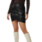 The short-sleeve women's top worn with jeans for a casual look