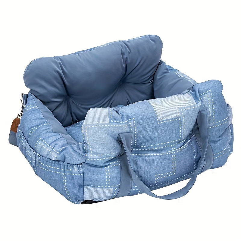 Padded car seat pet bed with raised bolster walls, carry handles and an inner clip showing the seat anchoring strap