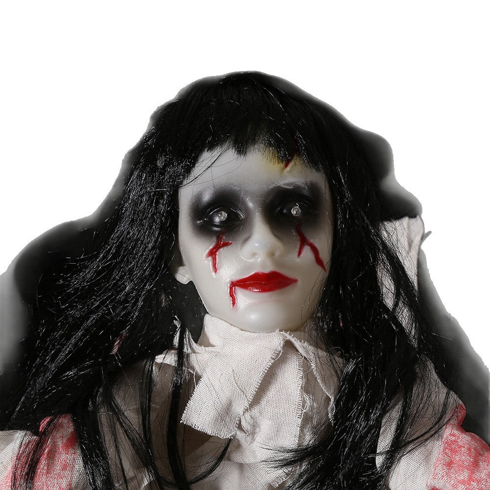 Close-up of the ghost prop pale face with red streak makeup, black hair and torn cloth collar