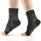 Close view of copper toned knit ankle compression sleeve showing diagonal weave and open heel opening