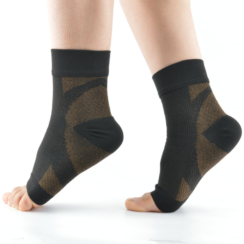 Close view of copper toned knit ankle compression sleeve showing diagonal weave and open heel opening