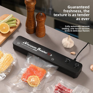 Black vacuum sealer on a kitchen counter beside vacuum sealed bags of corn, salmon and meat