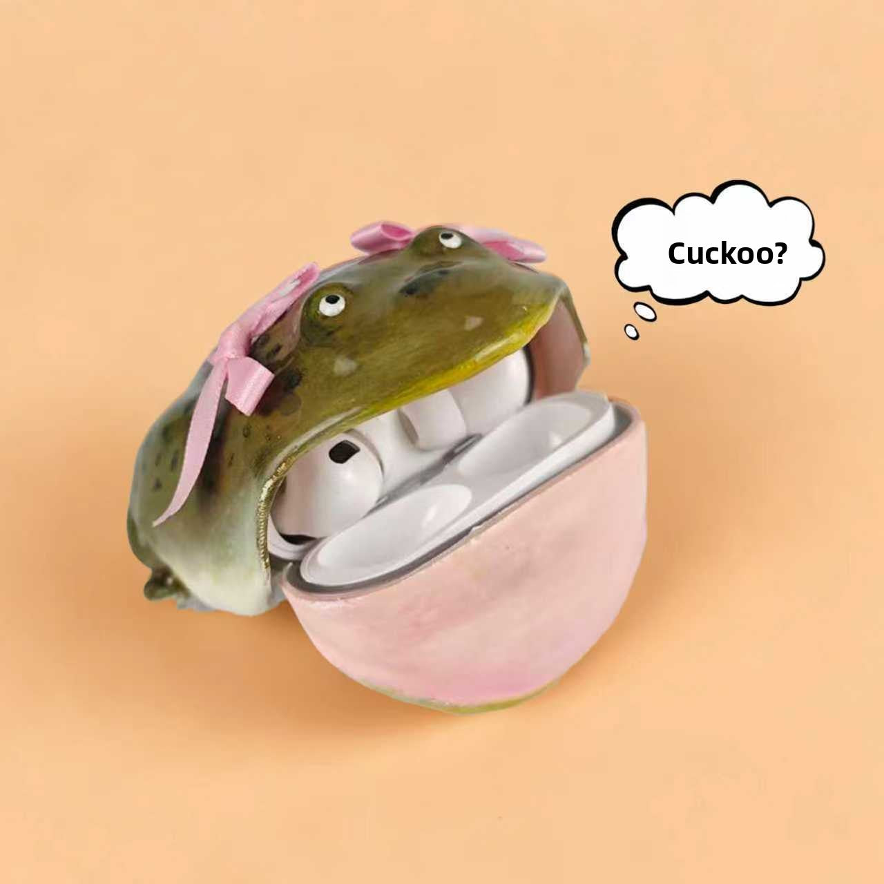 Olive frog case with pink bows open, AirPods Pro resting in the pale pink lower shell