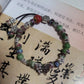 Handmade Ceramic Beads Strand | off-white background hero