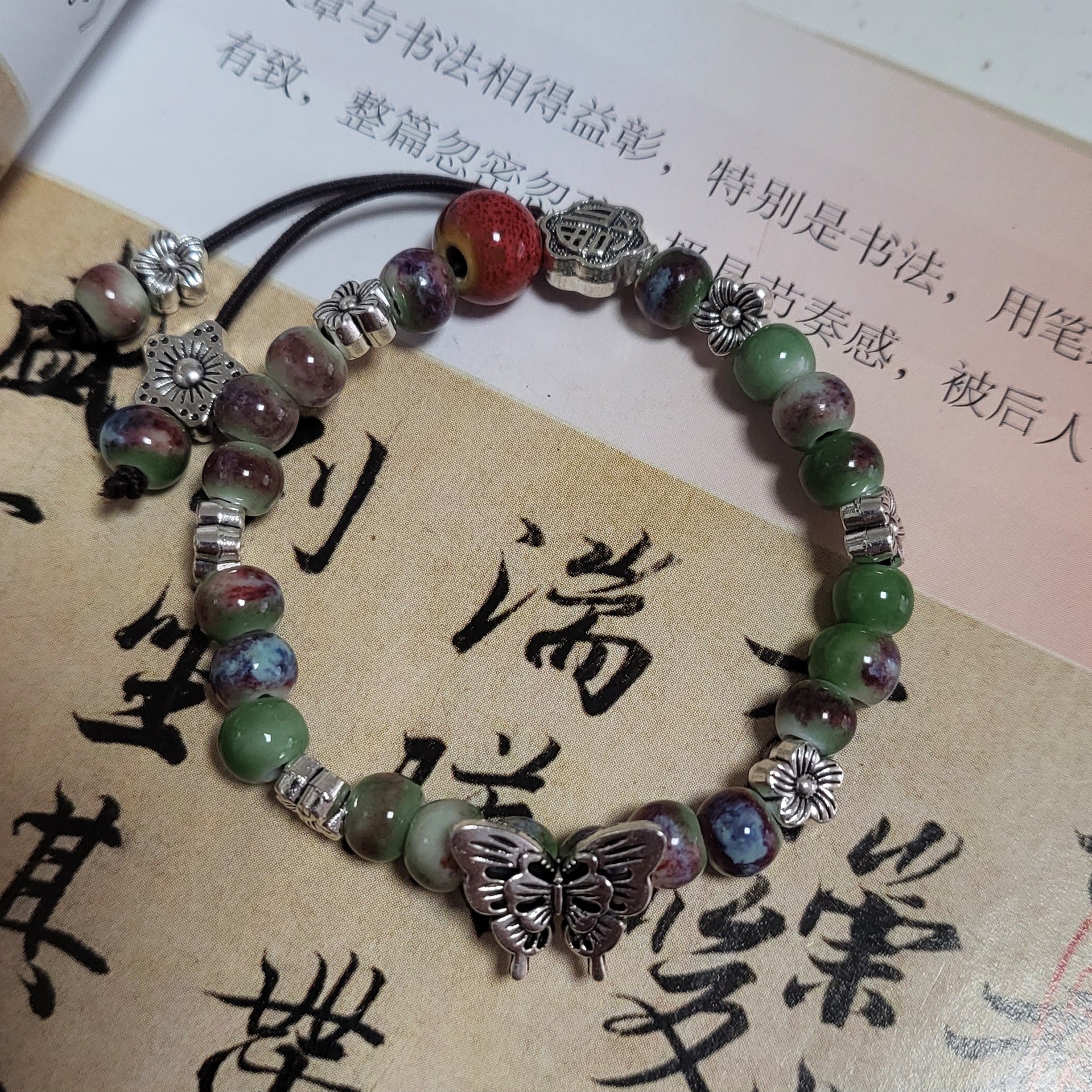Handmade Ceramic Beads Strand | off-white background hero