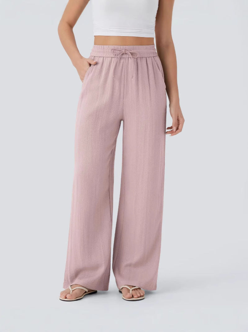 Side angle of relaxed wide-leg linen yoga pants