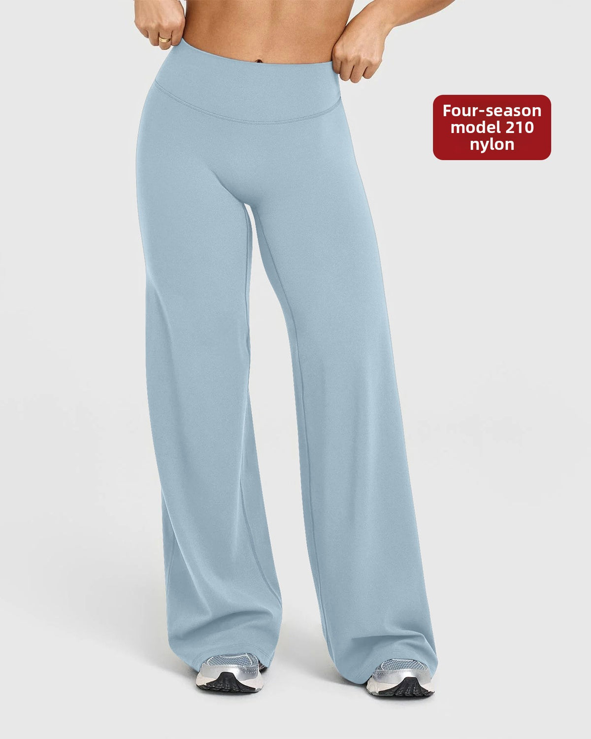 Curved back seam high waist wide leg pants on a standing model