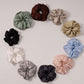 Champagne satin hair scrunchie with a soft sheen