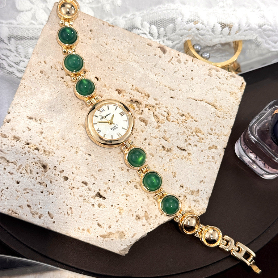 Stone beaded quartz watch styles shown together with gold and pale dials