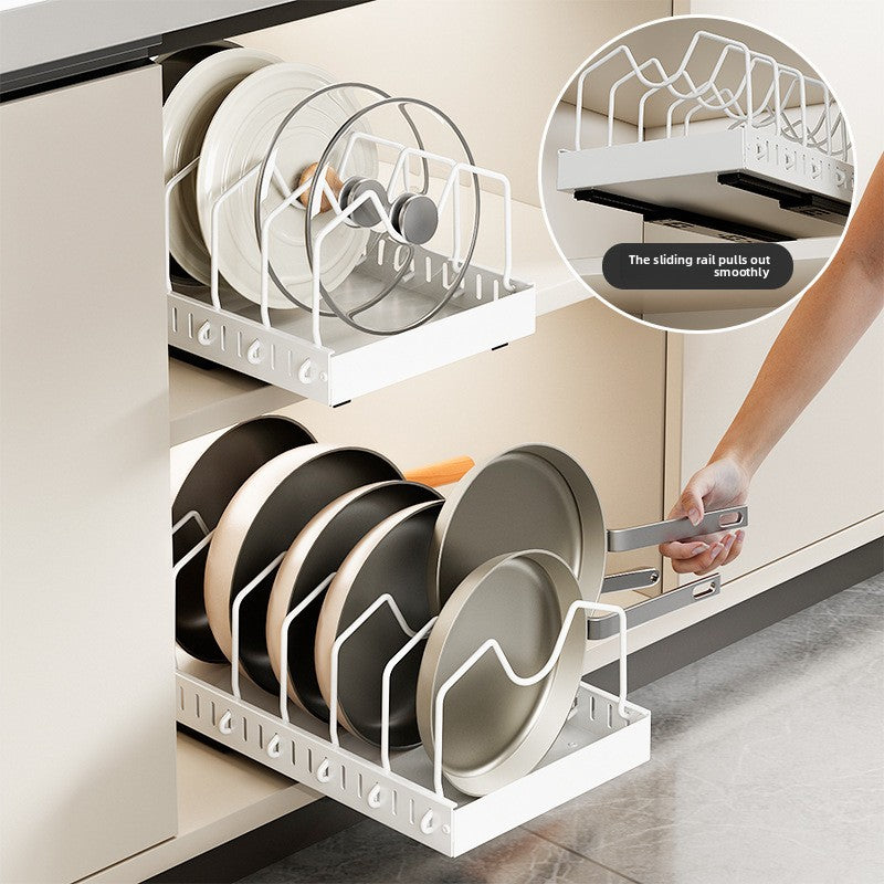 Black carbon steel pot rack without pull out rail on a kitchen surface