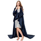 Woman standing in a long open front navy plain flannel blanket with sleeves, Flannel navy blue option
