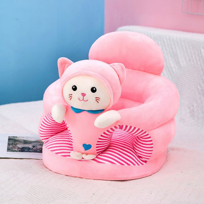 Pink plush baby floor seat with a cat friend at the front and a padded ring for the baby to sit in