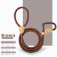Coiled braided rope slip lead in red with a leather stopper bead and a metal ring