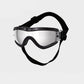Pet goggles laid flat showing the polycarbonate lens and frame