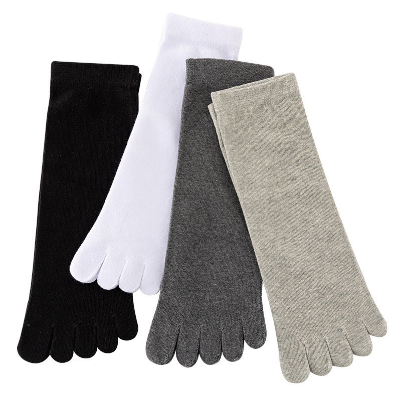 Four five-toe cotton socks laid flat in black, white, dark gray and light gray