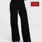 Curved back seam high waist wide leg pants on a standing model