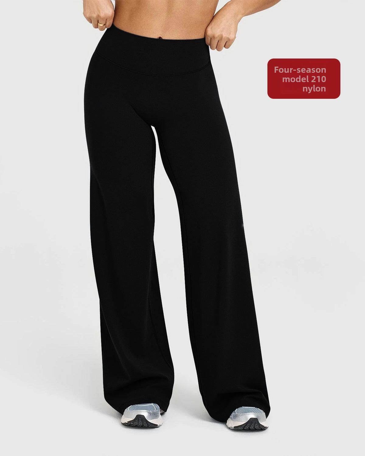 Curved back seam high waist wide leg pants on a standing model