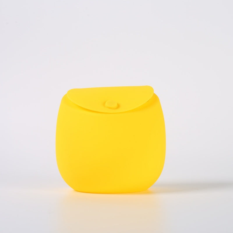 Silicone dog treat pouch open to show the soft flexible inside for treats