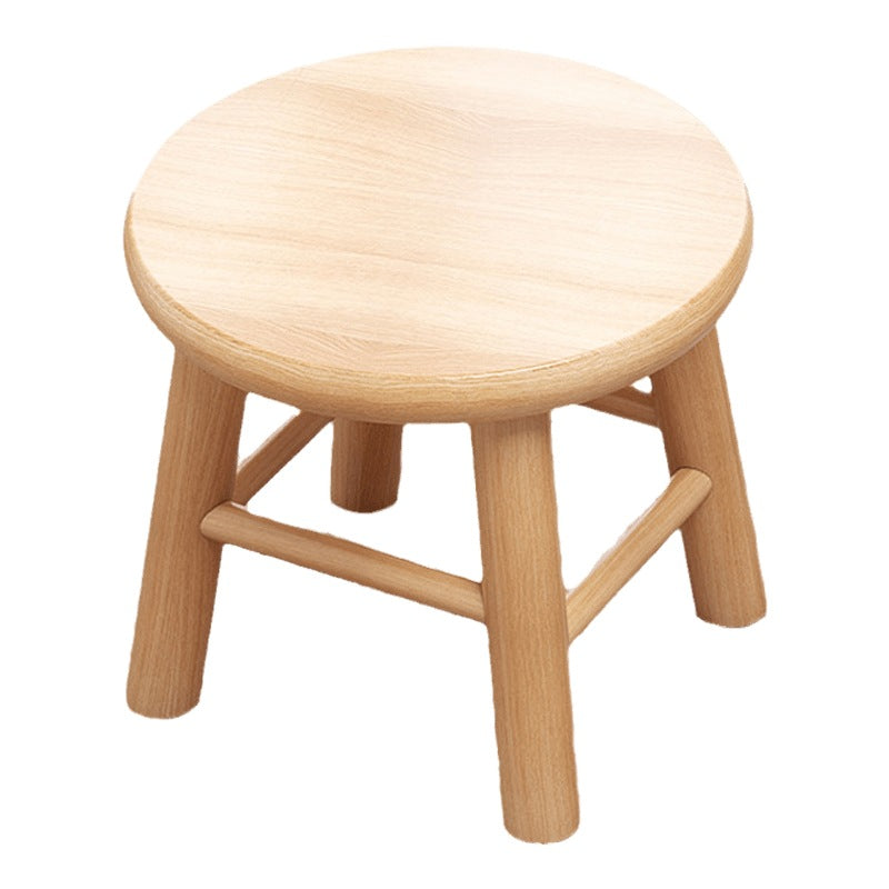 Solid wood stool with square legs and thick round seat in warm log wood tone
