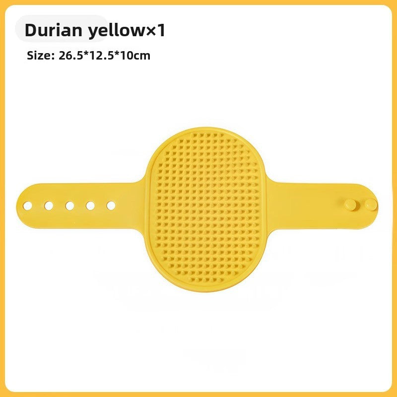 Durian yellow groomer brush shown flat next to the label size 26.5 by 12.5 by 10 cm
