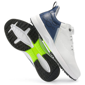 White and navy golf shoe with twist dial beside its spikeless outsole and green midfoot shank
