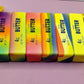 Row of six rainbow gradient butter stick squishy toys with printed butter labels, colorful 14 cm option