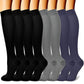 Compression socks in striped and printed styles arranged as a matching pair set