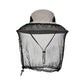 Mosquito net sun hat worn outdoors with the net down over the face
