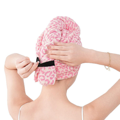 Leopard print microfiber towel hair wrap shown front on as a product hero shot