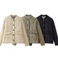 Onion quilted padded jacket shown flat to display the wavy stitching and ribbed stand collar
