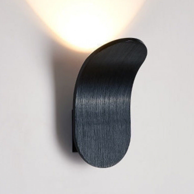 Brushed black curved wall lamp with upward glow, option photo for three color dimming