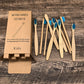 Soft-bristled bamboo toothbrush set | scale reference next to a hand