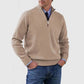 Apricot mens acrylic knit quarter zip stand collar pullover sweater worn by a standing male model