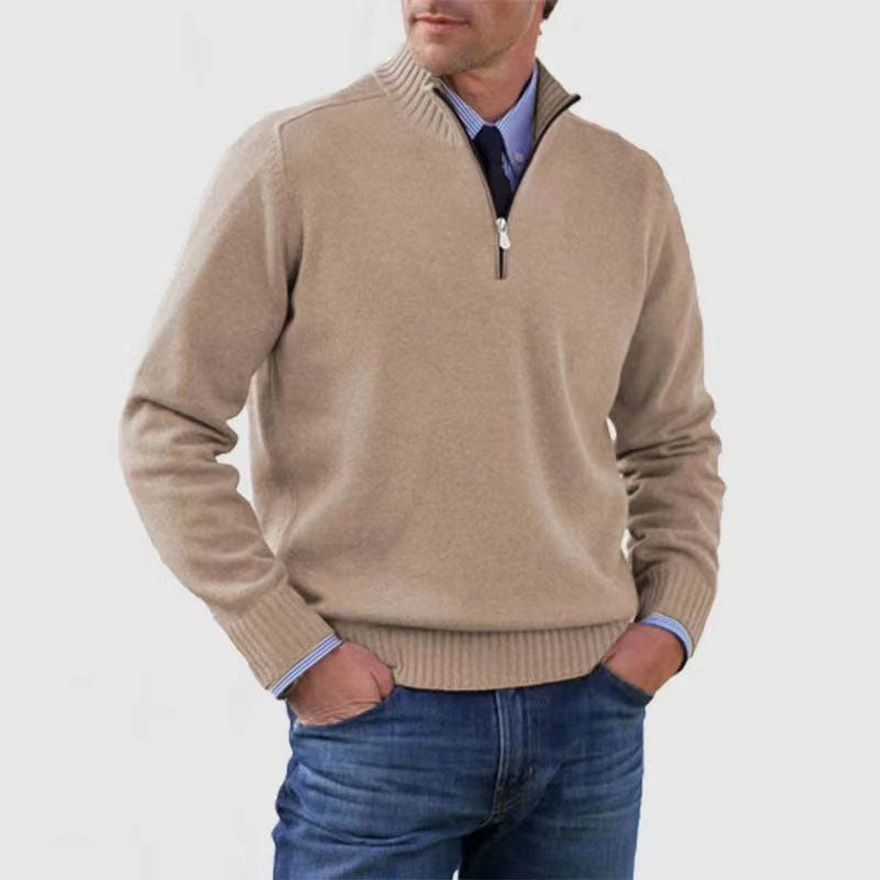 Apricot mens acrylic knit quarter zip stand collar pullover sweater worn by a standing male model