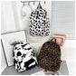 Plush Leopard Print Backpack | top down arrangement layout
