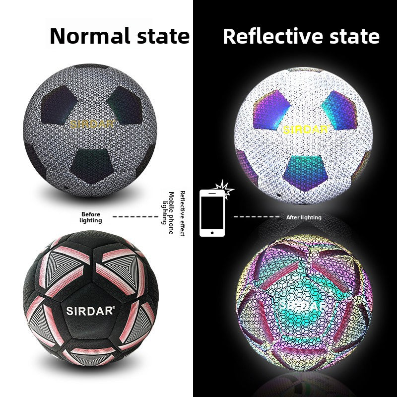Normal state and reflective state of silver grey and black pink footballs lit by a phone flashlight