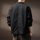 Workwear shirt jacket worn open over a plain tee, styled with denim for a layered casual look