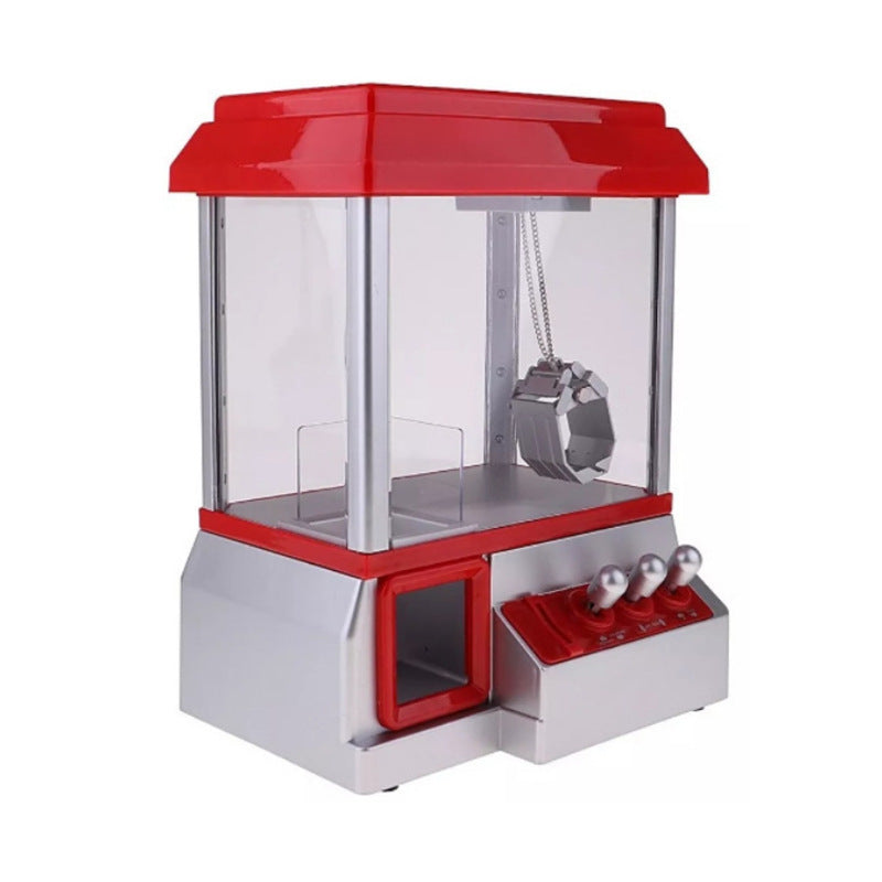 Empty toy claw machine with transparent panels, red roof, silver joysticks and prize exit window