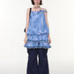 Detail of the soft lace hem against bare legs in afternoon light