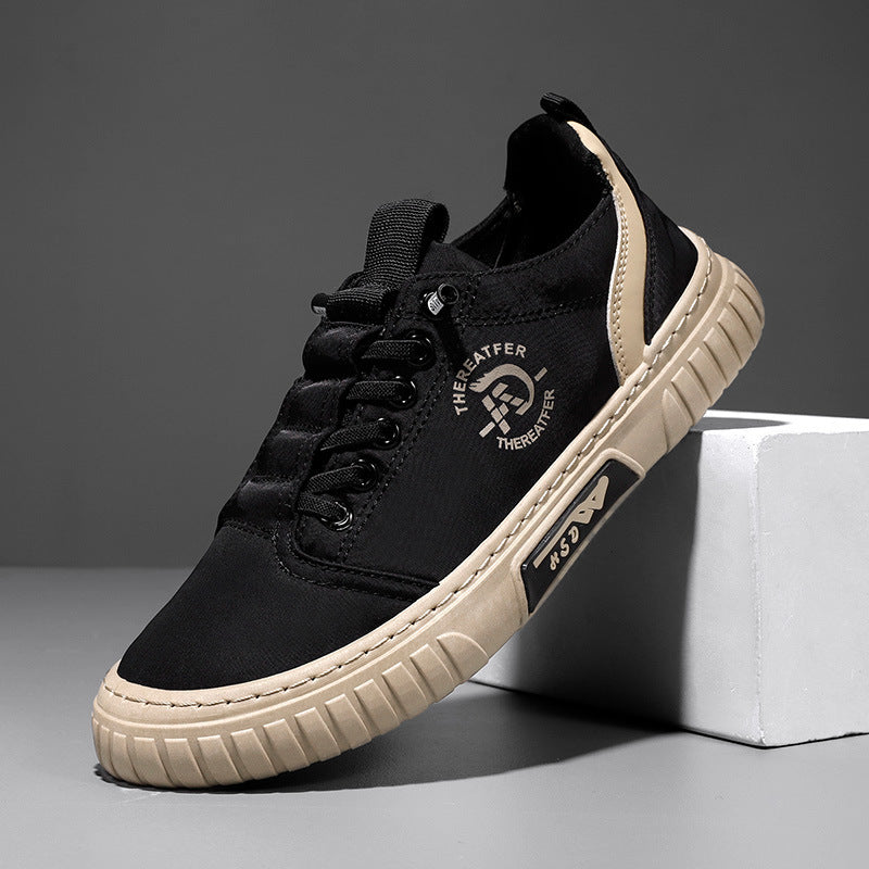 Black lace up canvas sneaker with a beige ribbed sole and heel stripe, leaning on a white block, size EU 41 option
