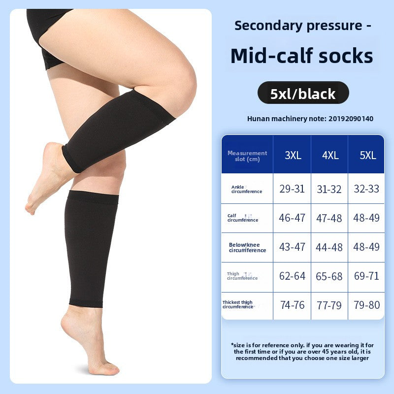 Black thigh high open toe compression stocking on the leg with a size measurement grid
