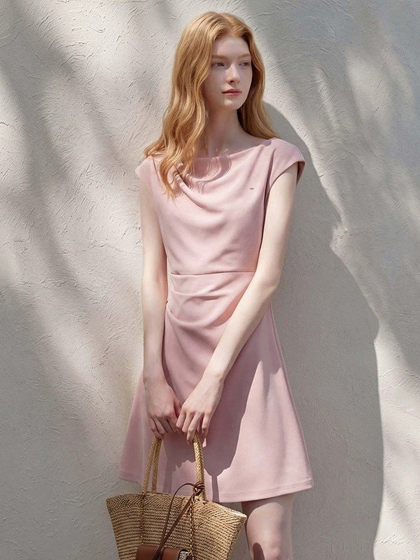 A-line cap sleeve ruched waist mini dress in soft stretch knit, back view of the round neck and flared skirt