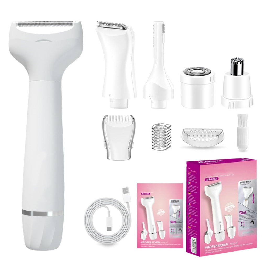 White grooming kit shown with its interchangeable shaver and trimmer heads