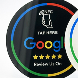 Round acrylic NFC smart card shown front on plain background