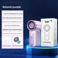 Purple handheld turbo fan next to its box and USB charging cable