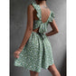 Floral square neck ruffle strap mini dress with a shirred bodice on a standing model, standing pose