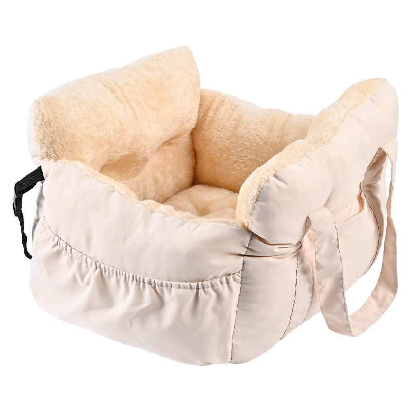 Padded car seat pet bed with raised bolster walls, carry handles and an inner clip showing the inner clip on its strap