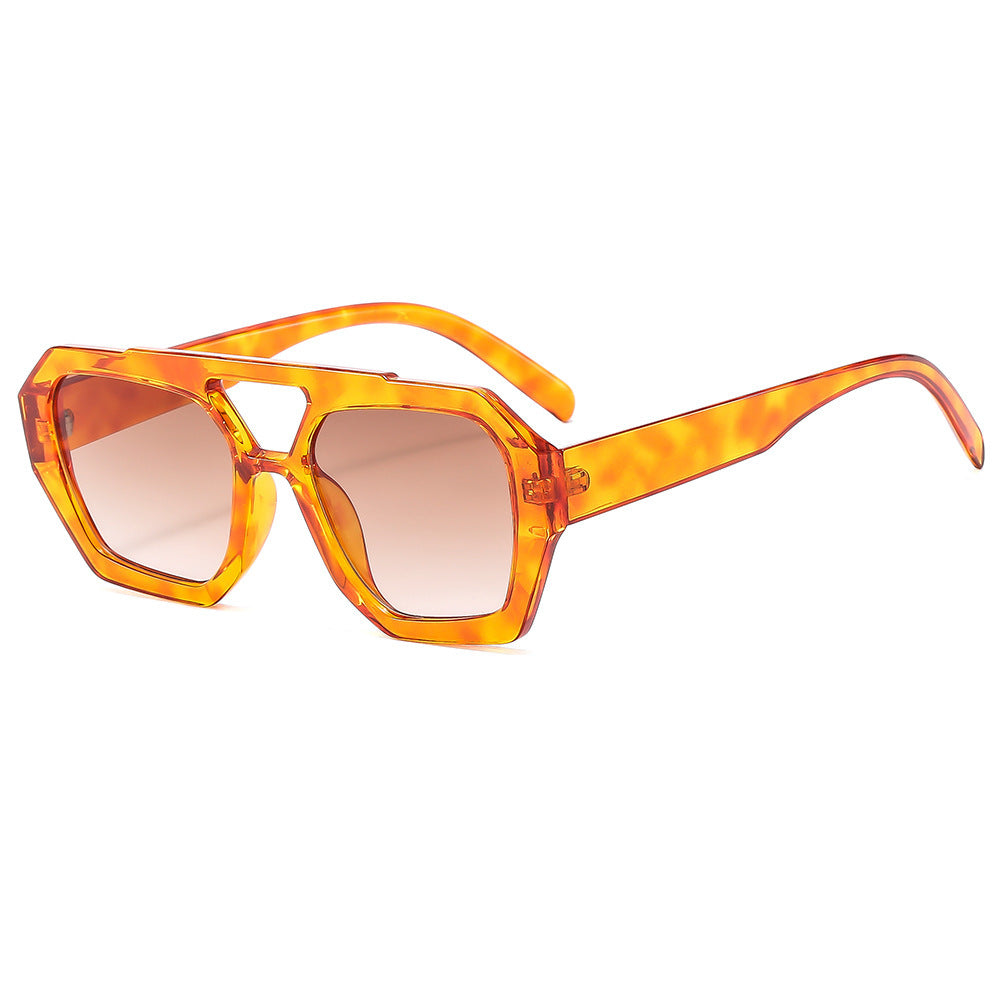 Close up scale reference of the polygonal frame and tinted lenses